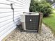 Exterior shot of a HVAC unit surrounded by gravel on the side of the home at 1027 Springway Dr, Shelbyville, IN 46176