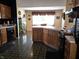 Charming kitchen with oak cabinets, an island, and a window for natural light, offering a cozy culinary space at 1027 Springway Dr, Shelbyville, IN 46176