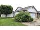 Spacious, well-maintained yard with privacy fence and lush landscaping at 1027 Springway Dr, Shelbyville, IN 46176