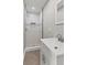 Modern bathroom with tiled shower, stylish fixtures, and mosaic accents throughout the bathroom at 10727 N Shupe Rd, Monrovia, IN 46157