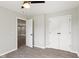 Bedroom with hardwood floors and double closet doors offers easy access to the rest of the home at 10727 N Shupe Rd, Monrovia, IN 46157