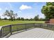 Enjoy views of the lush golf course from the spacious back deck at 10753 Seaview Ln, Indianapolis, IN 46236