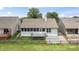 Charming home with backyard deck, screened in porch, and a fenced yard at 10753 Seaview Ln, Indianapolis, IN 46236