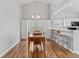 Bright dining room leading to the kitchen with lots of natural light at 10753 Seaview Ln, Indianapolis, IN 46236