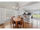Dining room leading to the kitchen with ample storage at 10753 Seaview Ln, Indianapolis, IN 46236