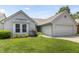 Charming single-Gathering home with a well-manicured lawn and attached two-car garage at 10753 Seaview Ln, Indianapolis, IN 46236