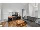 Comfortable living room with a modern entertainment center and gray sofa at 10753 Seaview Ln, Indianapolis, IN 46236
