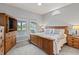 Comfortable main bedroom featuring a wooden bed frame and scenic view at 10753 Seaview Ln, Indianapolis, IN 46236