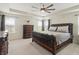 Main bedroom featuring a decorative ceiling fan and large dresser at 10811 Wild Orchard Ln, Indianapolis, IN 46239