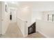 Upstairs hallway with carpet flooring at 10811 Wild Orchard Ln, Indianapolis, IN 46239