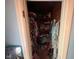 Walk in closet with wood shelving and hanging clothing at 111 S Jefferson St, Brownsburg, IN 46112
