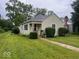 Charming single-story home featuring a well-maintained lawn and cozy front porch at 111 S Jefferson St, Brownsburg, IN 46112