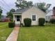 Charming front exterior of home features a well-manicured lawn, walkway, and inviting entrance at 111 S Jefferson St, Brownsburg, IN 46112
