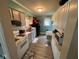 Bright kitchen featuring a gas range stove and black appliances at 111 S Jefferson St, Brownsburg, IN 46112