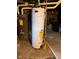 Basement view features a water heater and furnace, highlighting the home's essential systems at 111 S Jefferson St, Brownsburg, IN 46112