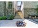 Backyard featuring ornate fire pit and walkway to main house at 11557 Willow Springs Dr, Zionsville, IN 46077