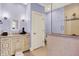 Bright bathroom with a granite vanity, tiled shower, and neutral paint at 11557 Willow Springs Dr, Zionsville, IN 46077