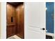 Interior view of a wood-paneled elevator at 11557 Willow Springs Dr, Zionsville, IN 46077