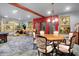 Luxurious game room featuring a pool table and dining area for relaxation and entertainment at 11557 Willow Springs Dr, Zionsville, IN 46077
