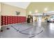 Finished garage showcasing basketball court and ample storage at 11557 Willow Springs Dr, Zionsville, IN 46077