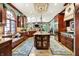 Expansive kitchen with a large island, custom cabinetry, high-end appliances, and elegant finishes at 11557 Willow Springs Dr, Zionsville, IN 46077