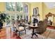 Living room features hardwood floors, fireplace, ornate furniture, and floor to ceiling windows at 11557 Willow Springs Dr, Zionsville, IN 46077