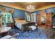 Elegant bedroom with ornate furnishings and beautiful natural light at 11557 Willow Springs Dr, Zionsville, IN 46077