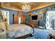 Beautiful bedroom with antique furniture, an elaborate ceiling, and a cozy atmosphere at 11557 Willow Springs Dr, Zionsville, IN 46077