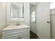 Classic bathroom featuring a vintage vanity with storage and neutral walls at 1217 S Post Rd, Indianapolis, IN 46239