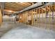 Expansive unfinished basement with concrete floors, offering endless possibilities for customization at 12839 Bird Cage, Carmel, IN 46032
