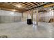 Spacious unfinished basement with concrete flooring, perfect for customization and storage at 12839 Bird Cage, Carmel, IN 46032