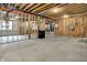 Unfinished basement ready to be built out to suit the owner's needs with high ceilings and exposed beams at 12839 Bird Cage, Carmel, IN 46032