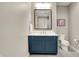 Bright bathroom with a tile floor, vanity with drawers, and a toilet at 12839 Bird Cage, Carmel, IN 46032