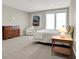 Spacious bedroom featuring neutral walls, soft carpet, and a large window at 12839 Bird Cage, Carmel, IN 46032