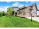 Charming home with a lush lawn, landscaped yard, and attached three-car garage at 12839 Bird Cage, Carmel, IN 46032