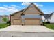 Spacious two-car garage with ample parking on a sunny day at 12839 Bird Cage, Carmel, IN 46032