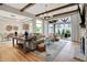 Bright and airy living room featuring hardwood floors and a fireplace at 12839 Bird Cage, Carmel, IN 46032