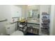 Bathroom featuring walk-in shower, vanity, and neutral paint at 13 Fairlane Dr, Brownsburg, IN 46112