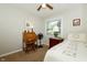 This bedroom features a desk, bedside table and a comfortable bed at 13 Fairlane Dr, Brownsburg, IN 46112