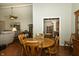 Dining room with hardwood flooring and access to the kitchen at 13 Fairlane Dr, Brownsburg, IN 46112