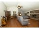 Bright living room with vaulted ceiling and brick fireplace at 13 Fairlane Dr, Brownsburg, IN 46112