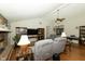 Bright living room with vaulted ceilings, hardwood floors, and comfortable seating at 13 Fairlane Dr, Brownsburg, IN 46112