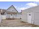 Spacious backyard featuring a wooden deck and access to the home and garage at 1310 California St, Columbus, IN 47201