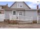 Inviting backyard features a wooden deck and access to the home at 1310 California St, Columbus, IN 47201