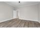 A clean and bright bedroom featuring modern ceiling fan, flooring and white trim at 1310 California St, Columbus, IN 47201