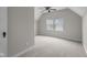 Bedroom with carpet, window and ceiling fan providing comfort and natural light at 1310 California St, Columbus, IN 47201