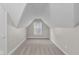Bright bedroom with neutral walls, carpet, and natural light from the window at 1310 California St, Columbus, IN 47201