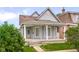 Charming, two-story home with welcoming front porch and well-maintained landscaping at 1310 California St, Columbus, IN 47201