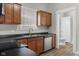 Well-lit kitchen features wooden cabinets, stainless steel appliances, and modern countertops at 1310 California St, Columbus, IN 47201