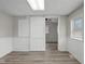 Room showcasing a sliding barn door, enhancing the space's character and functionality at 1310 California St, Columbus, IN 47201